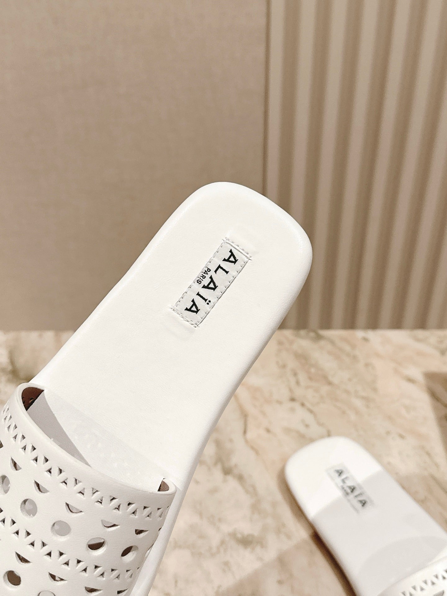 Alaia 2025 Hollow Slippers White Leather 293655