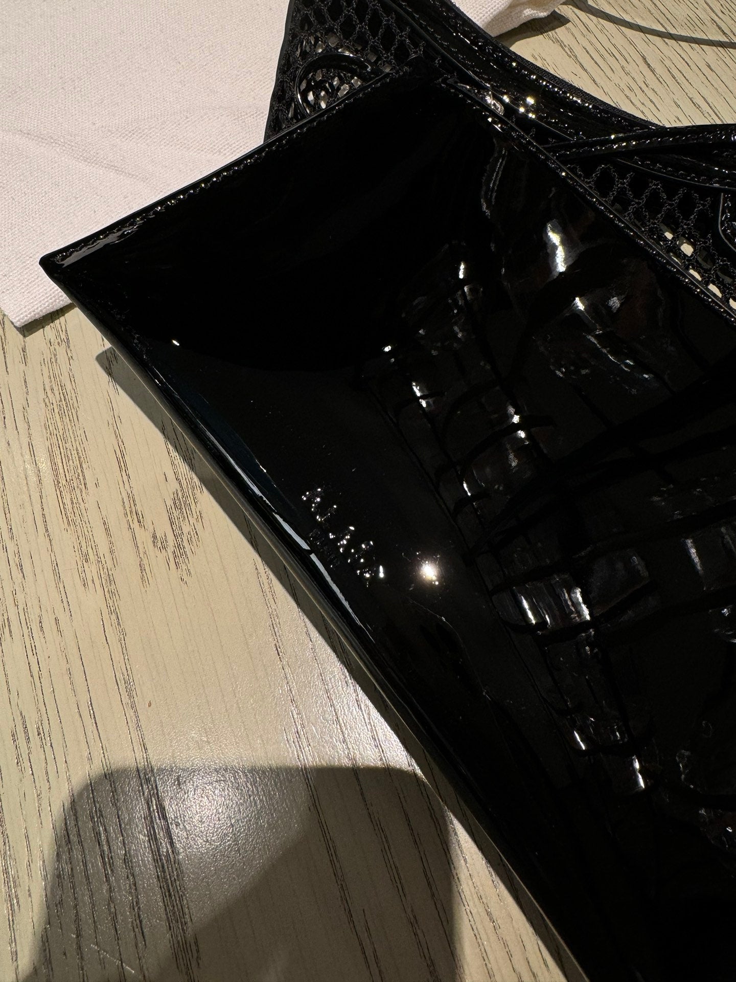 ALAIA ONE PIECE half-moon bag black patent leather 243053