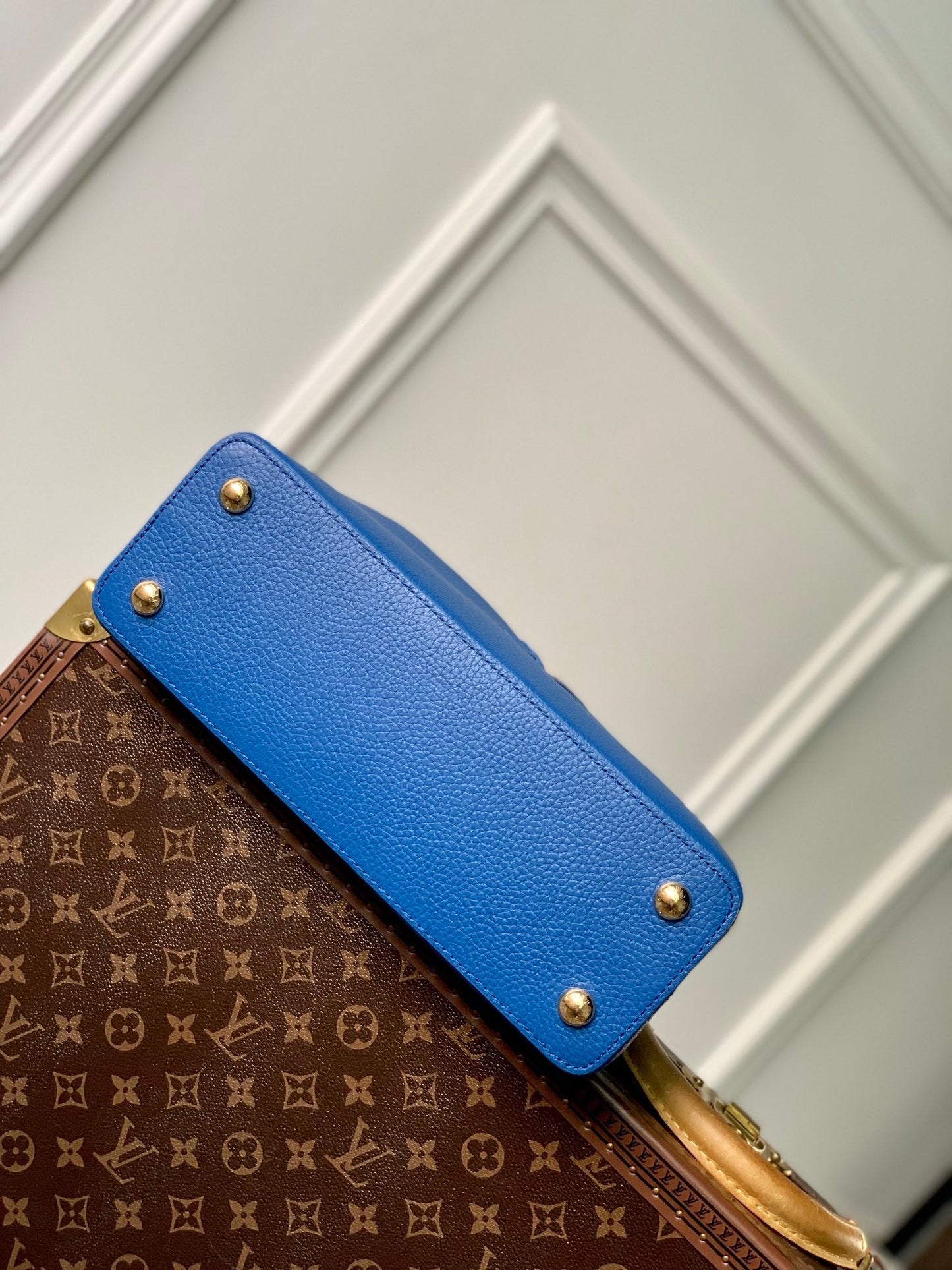 capucines mm 31.5 cobalt blue taurillon leather gold hardware