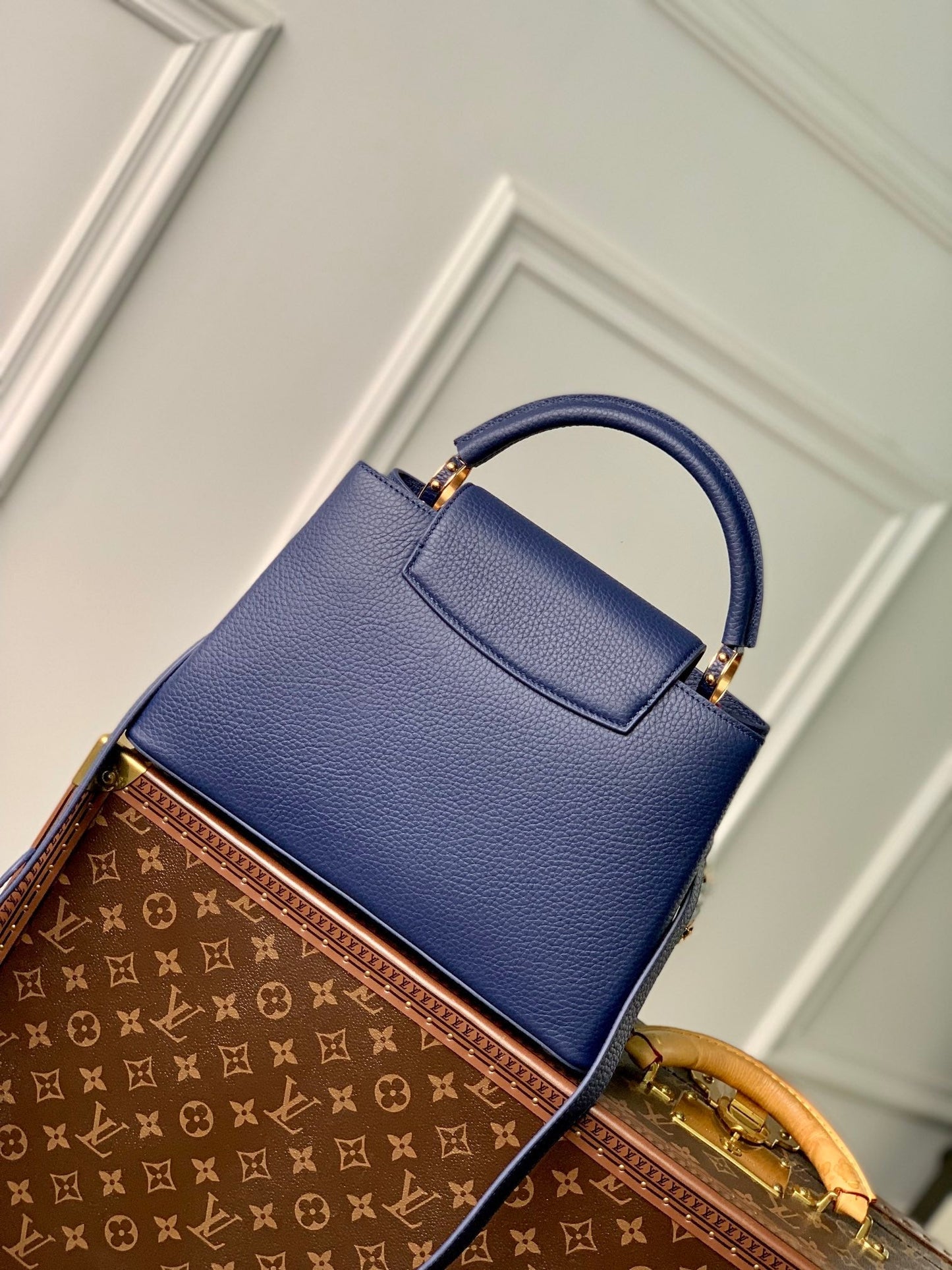 capucines mm 31.5 dark blue taurillon leather gold hardware