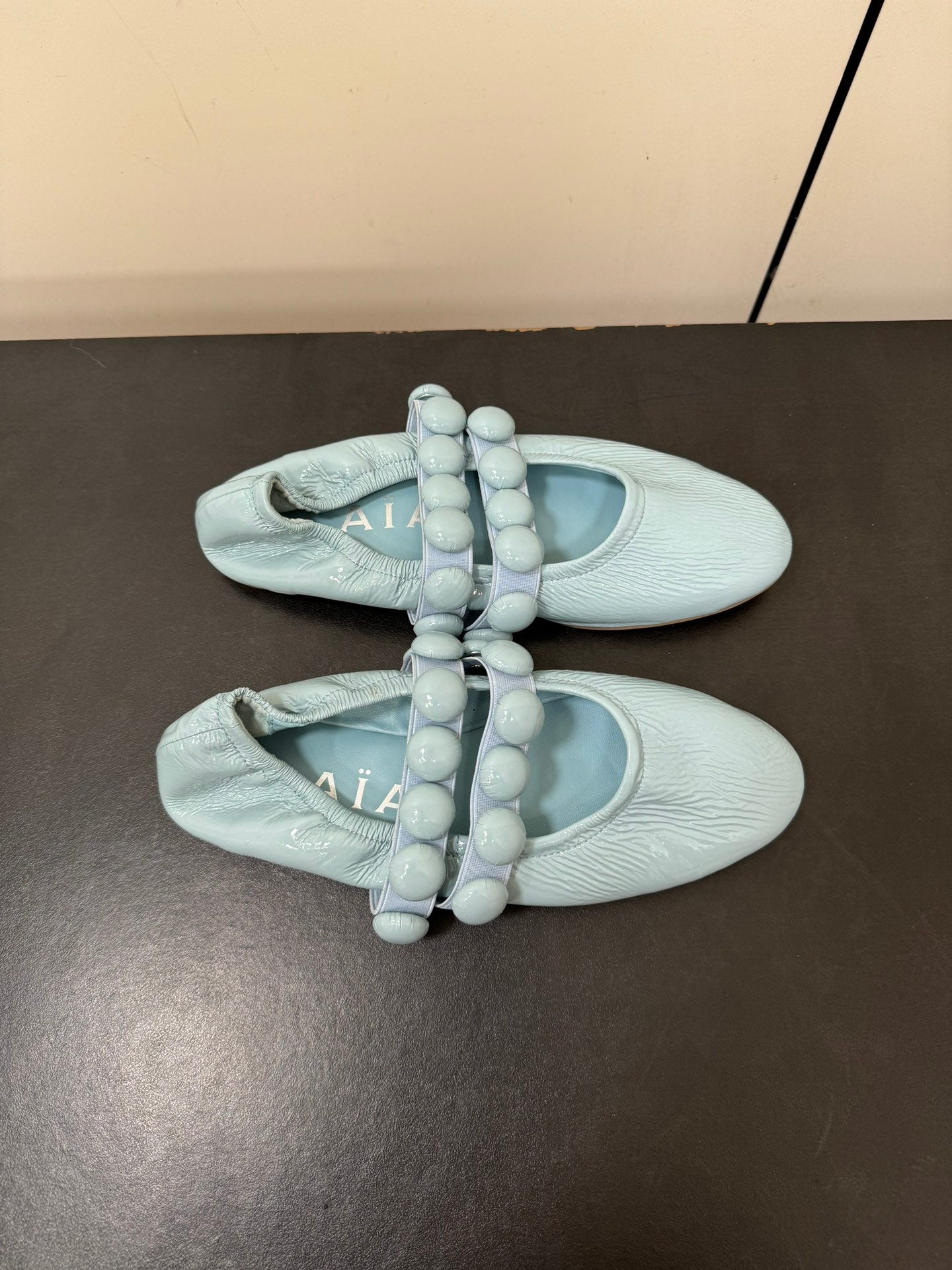 ALAIA SPHERE BALLET FLATS IN LIGHT BLUE LAMBSKIN