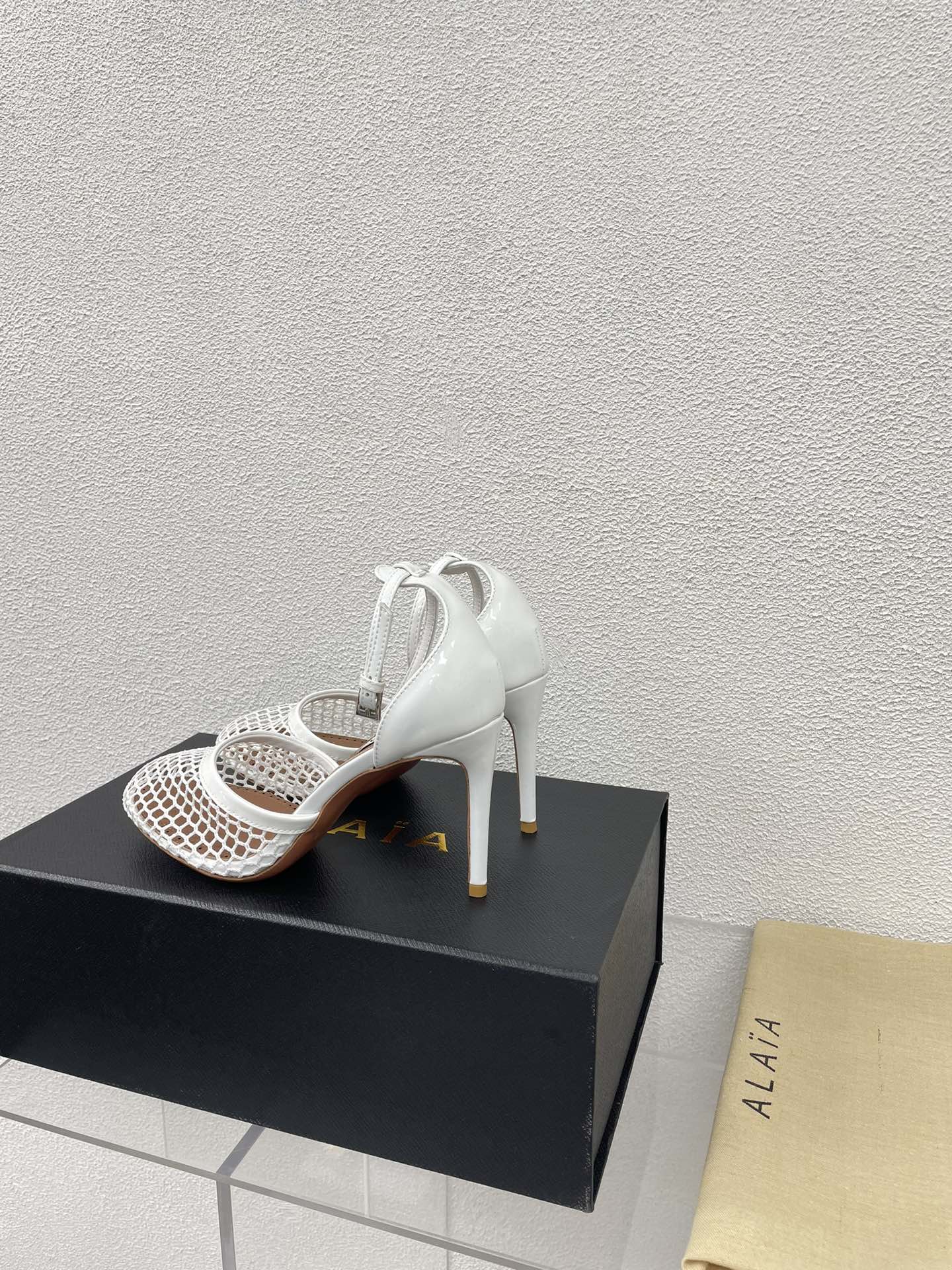 ALAIA HIGH FISHNET 9 CM PUMPS IN WHITE MESH