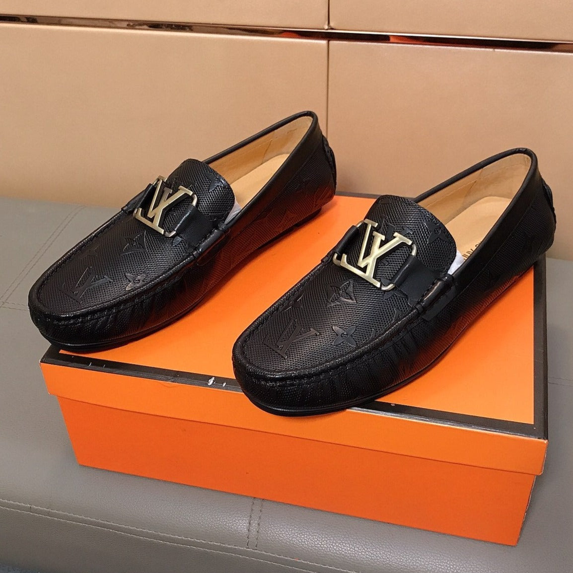 LV LOAFERS IN BLACK CALFSKIN WITH BRANDED EMBOSSING