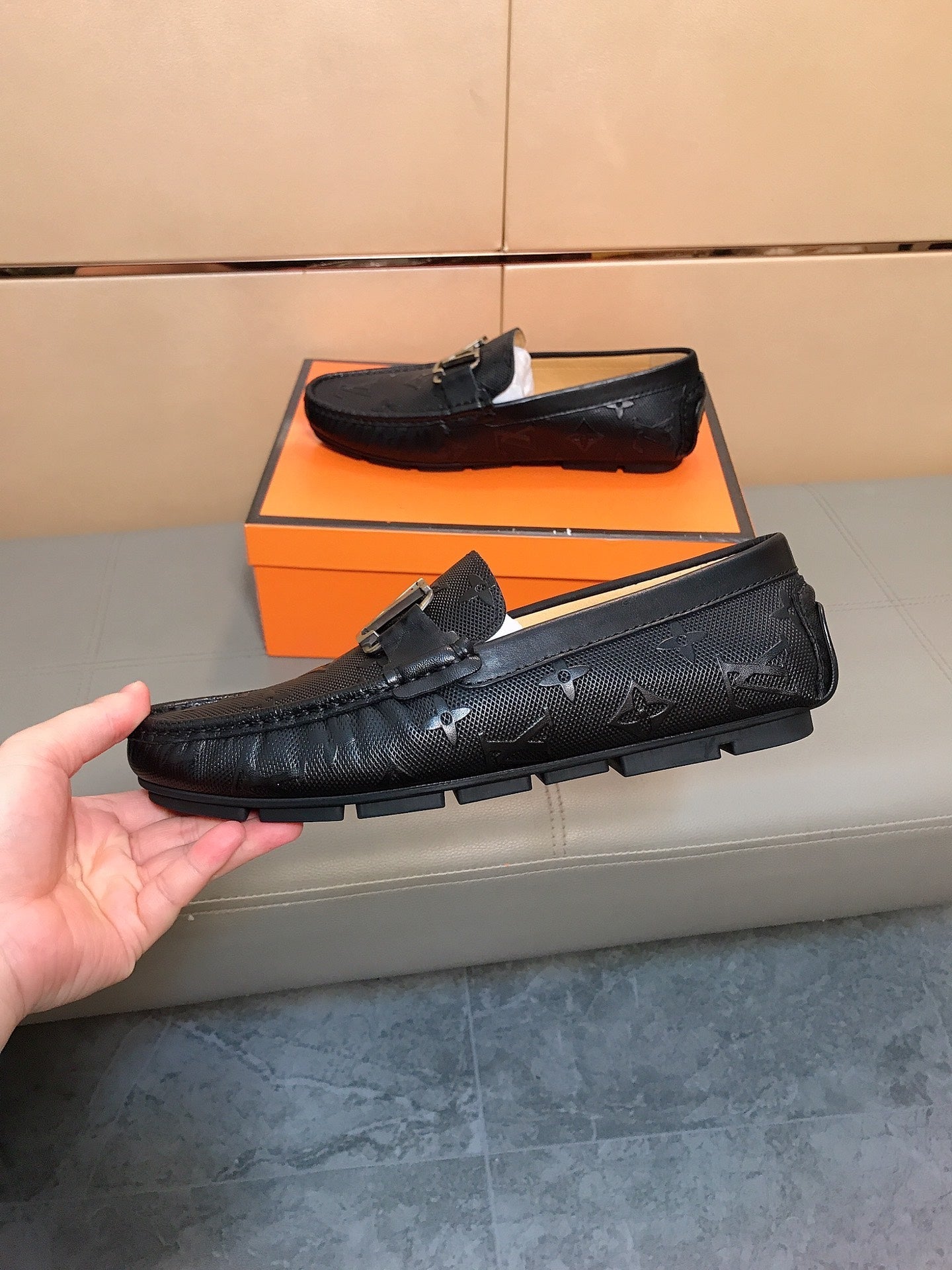LV LOAFERS IN BLACK CALFSKIN WITH BRANDED EMBOSSING
