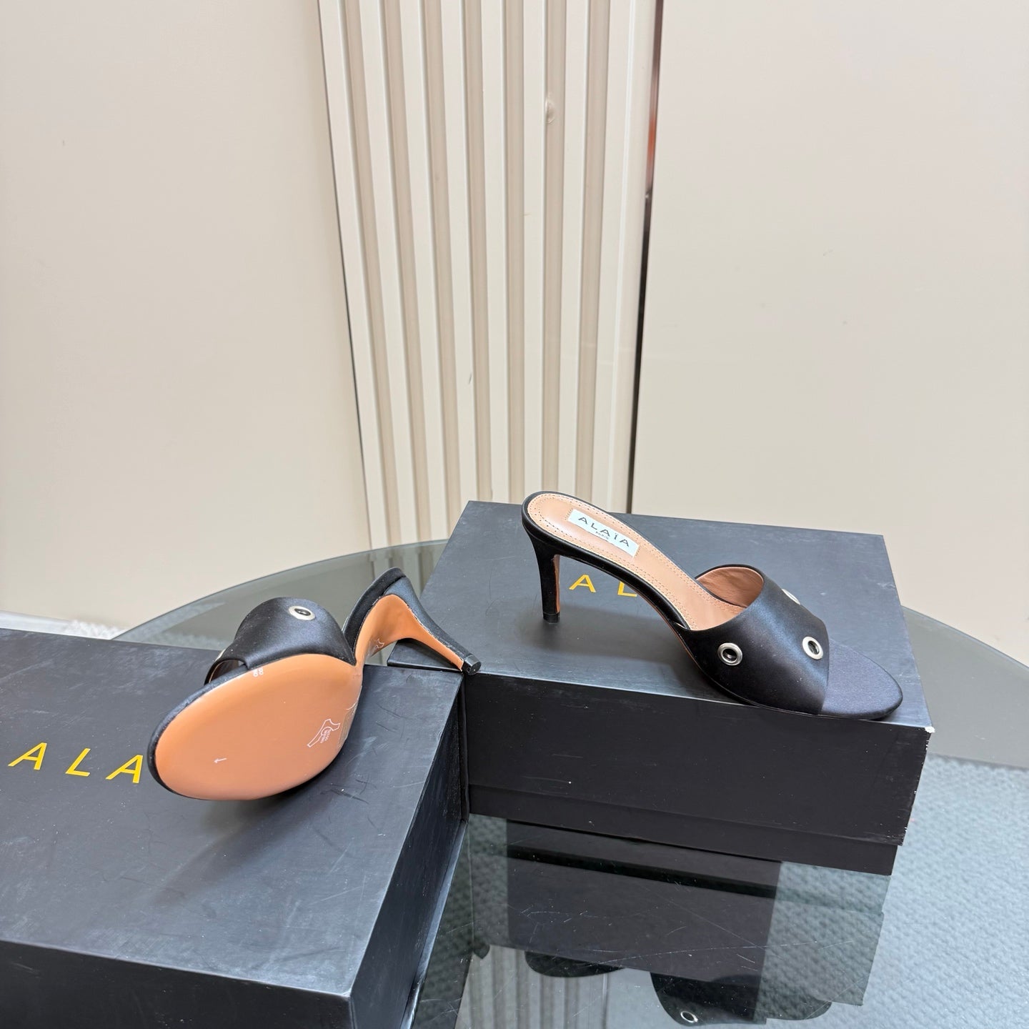 Alaia 2025 Oeillets Embellished Leather Sandals Black Lambskin 299669