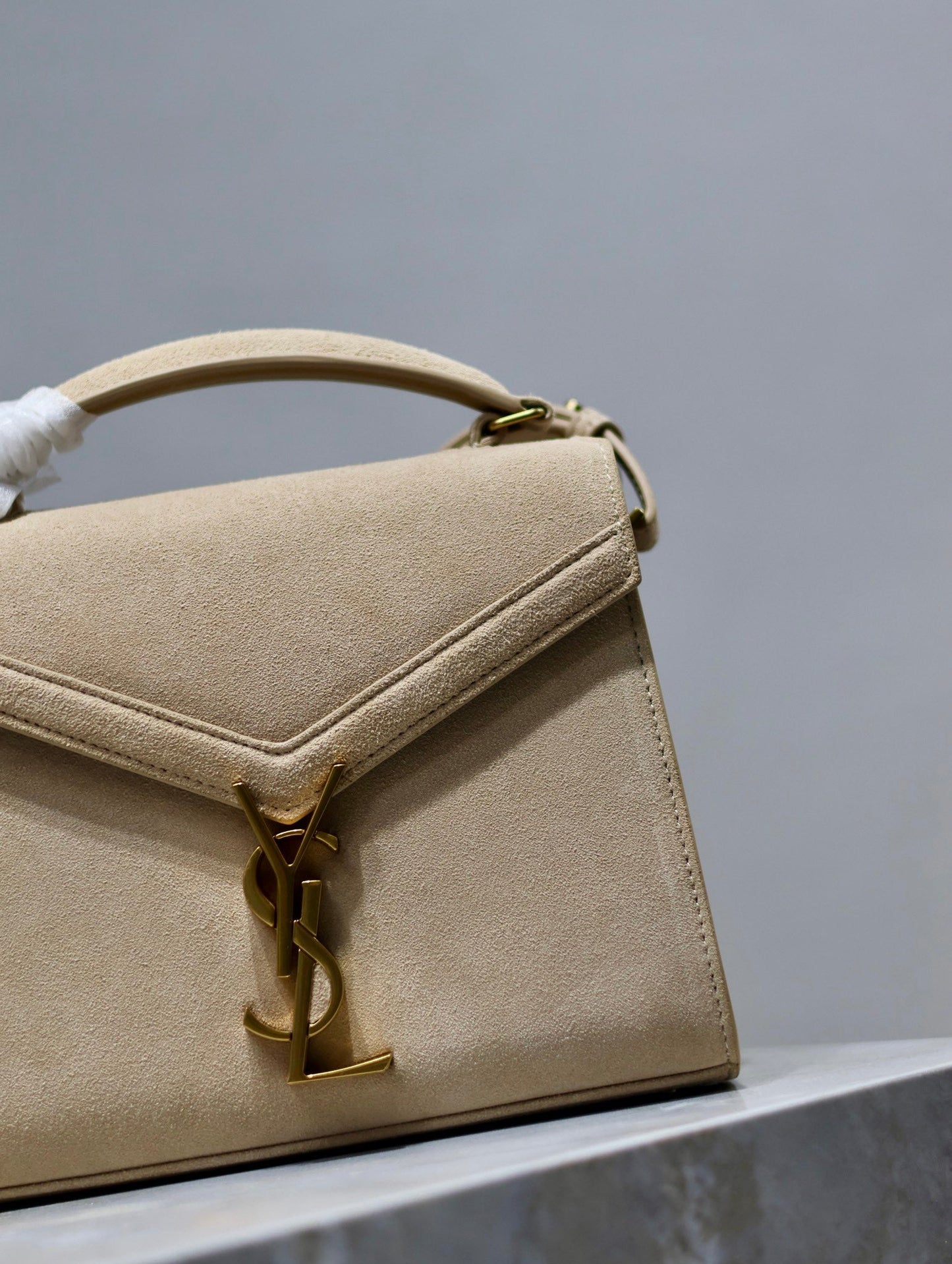 CASSANDRA MINI TOP HANDLE BAG 20 IN BEIGE SUEDE GOLD HARDWARE