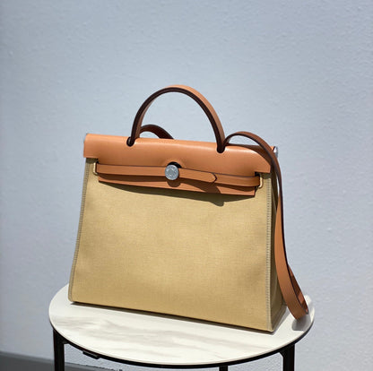 Herbag 31 Toile Beige Canvas Gold Cowhide Leather