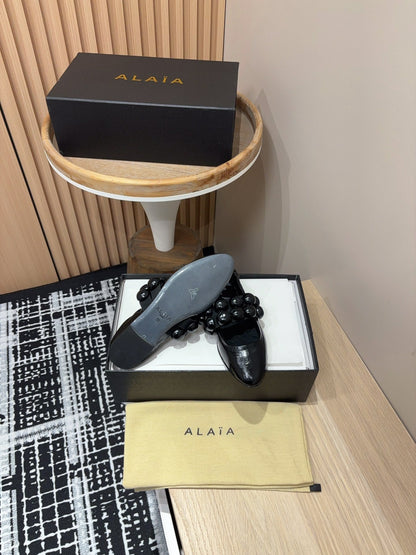 Alaila Sphere Ballet Flats In Black Glossy Calfskin 964200