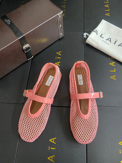 ALAIA BALLET FLATS IN LIGHT PINK MESH FISHNET
