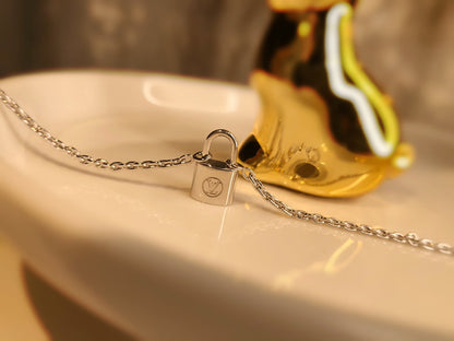LV CHARITY LOCK NECKLACE