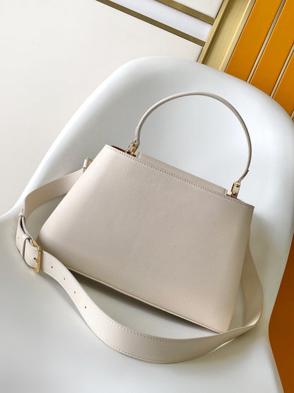 CAPUCINES GM 33CM BEIGE GOLD TAURILLON LEATHER 252023