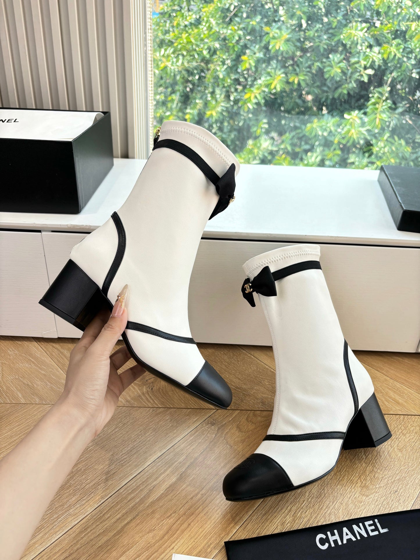 CC 25 Short Boot White Calfskin Black Bow 430317