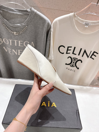 Alaia 25 Cube Wedge Mules Ivory Silk Sheepskin 300080