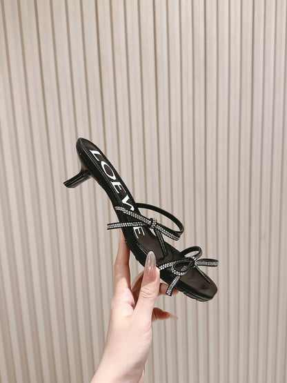 Loewe 25 Petal Bow Sandals Black Cowhide PVC