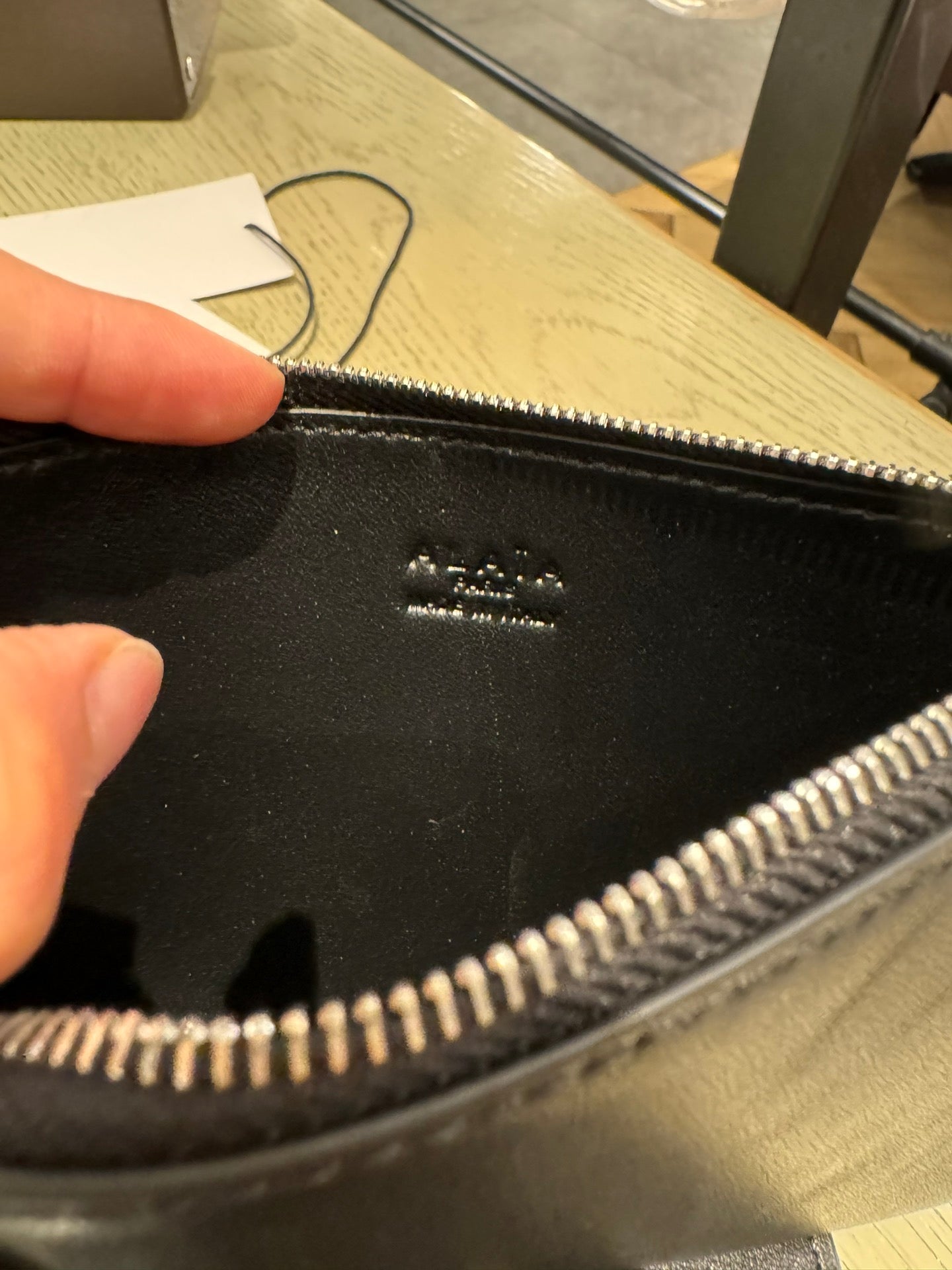 ALAIA Medium Hobo Flat Bag Metal Rivet Black Calfskin 243053