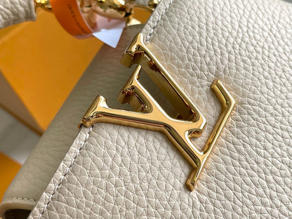 CAPUCINES BB 27 BEIGE TAURILLON GOLD HARDWARE