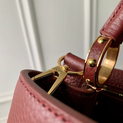 CAPUCINES MINI 21 BURGUNDY TAURILLON GOLD HARDWARE
