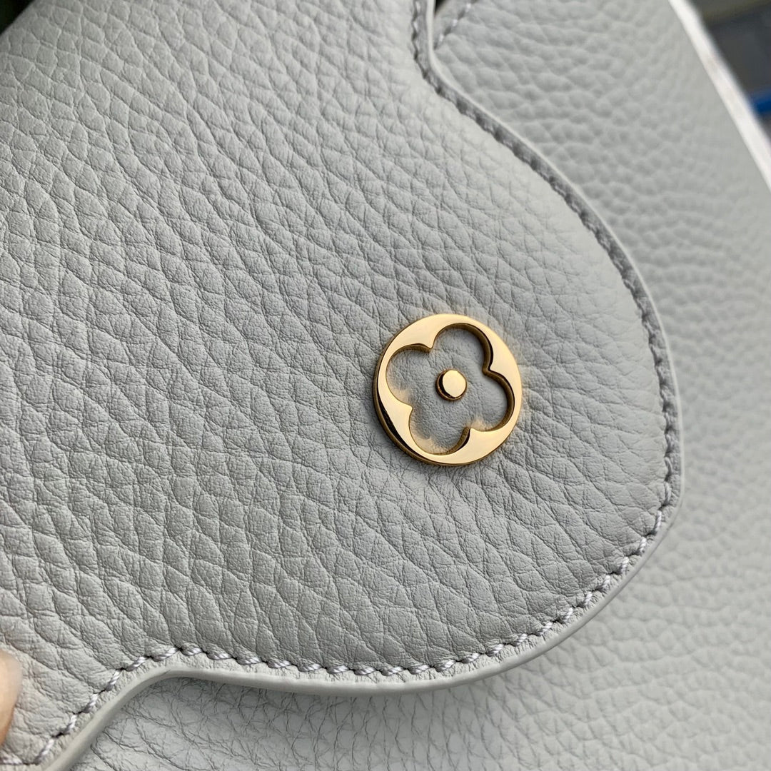 capucines mm 31.5 rock grey taurillon leather gold hardware
