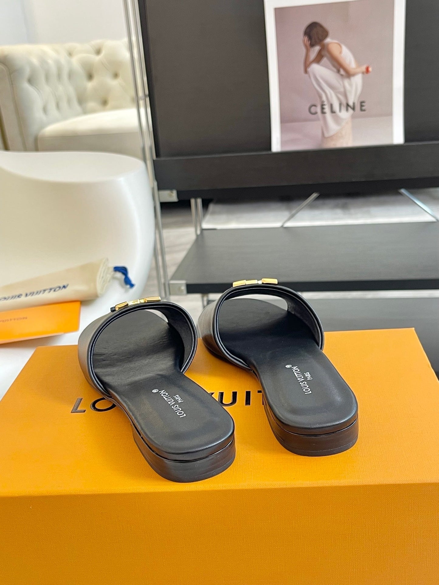 lv capri flat mule black calfskin