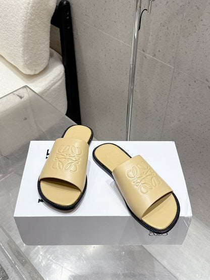 Loewe 25 flat slippers beige calfskin