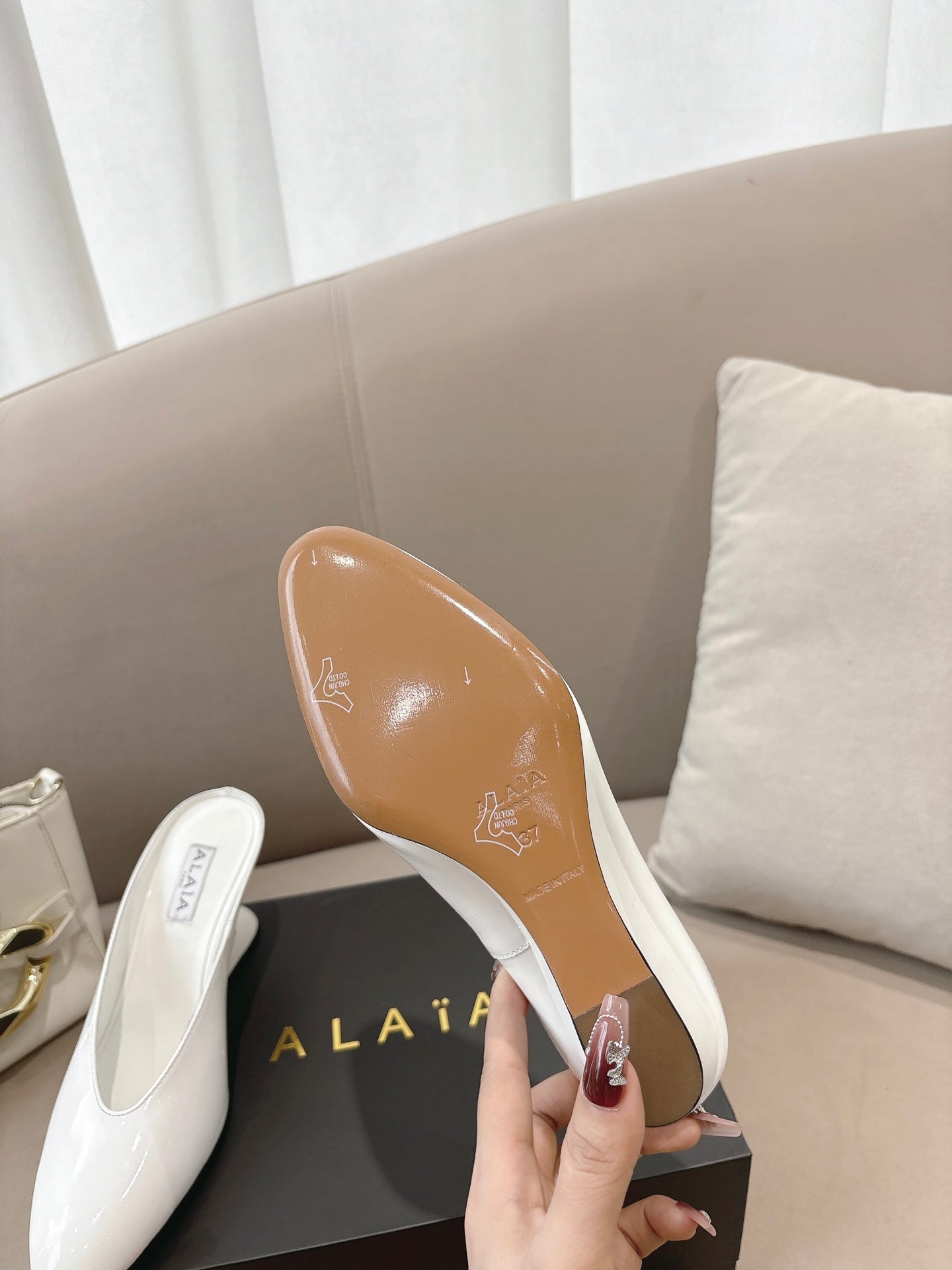 Alaia 25 Curve Wedge Mules White Lambskin 293554