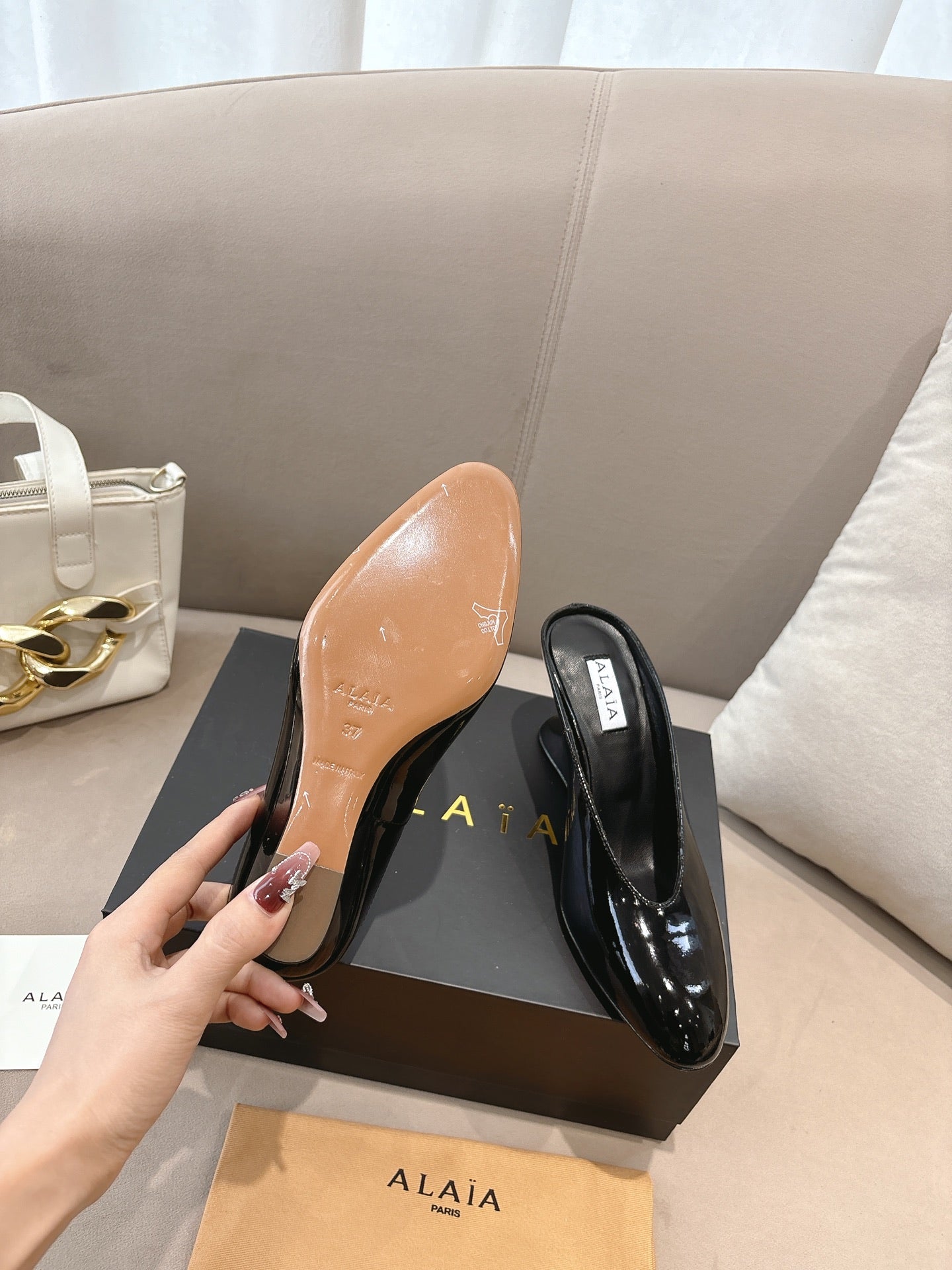 Alaia 25 Curve Wedge Mules Black Lambskin 293555