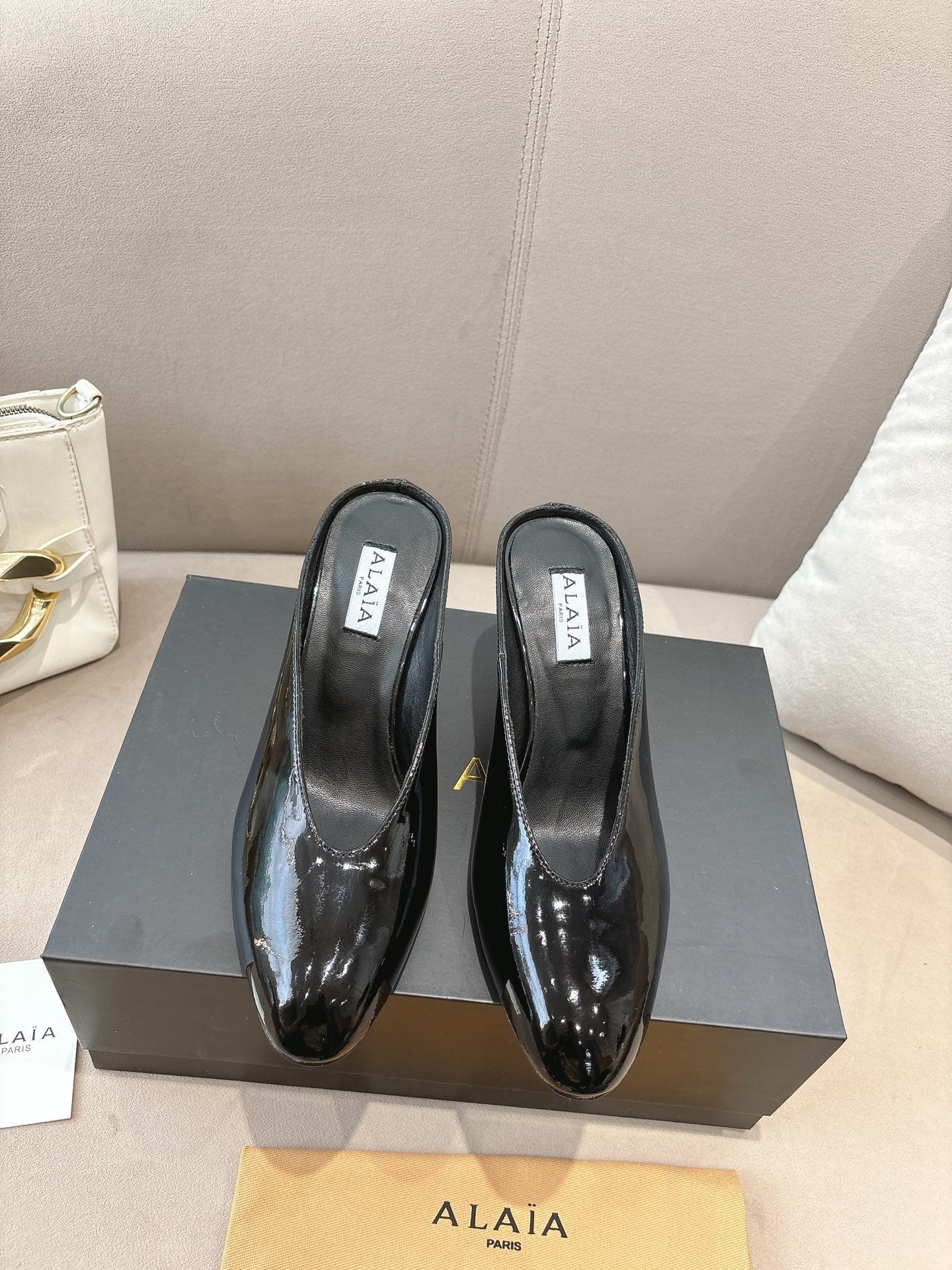 Alaia 25 Curve Wedge Mules Black Lambskin 293555