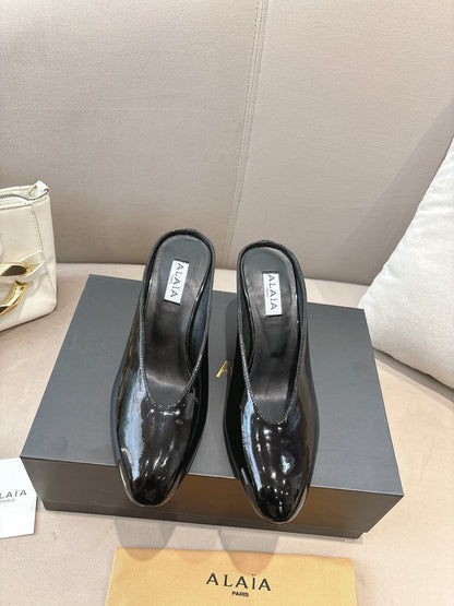 Alaia 25 Curve Wedge Mules Black Lambskin 293555