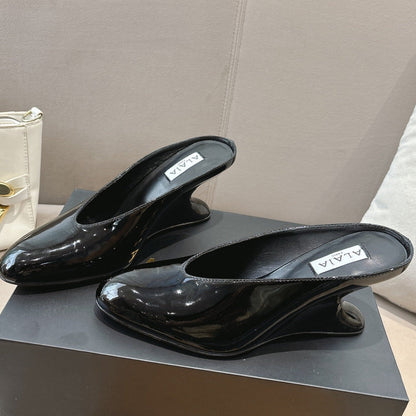 Alaia 25 Curve Wedge Mules Black Lambskin 293555