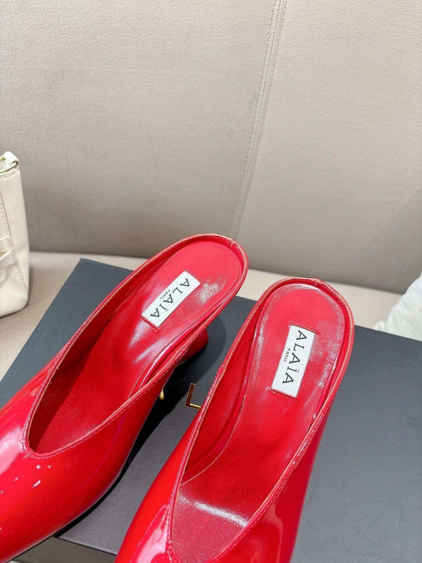 Alaia 25 Curve Wedge Mules Red Lambskin 293556