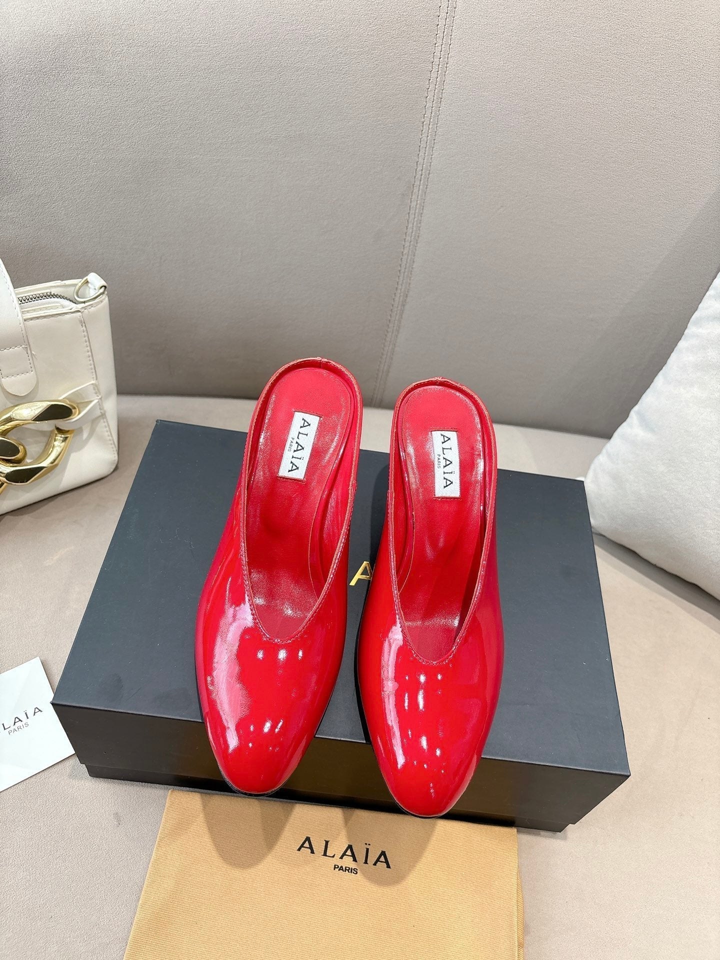 Alaia 25 Curve Wedge Mules Red Lambskin 293556