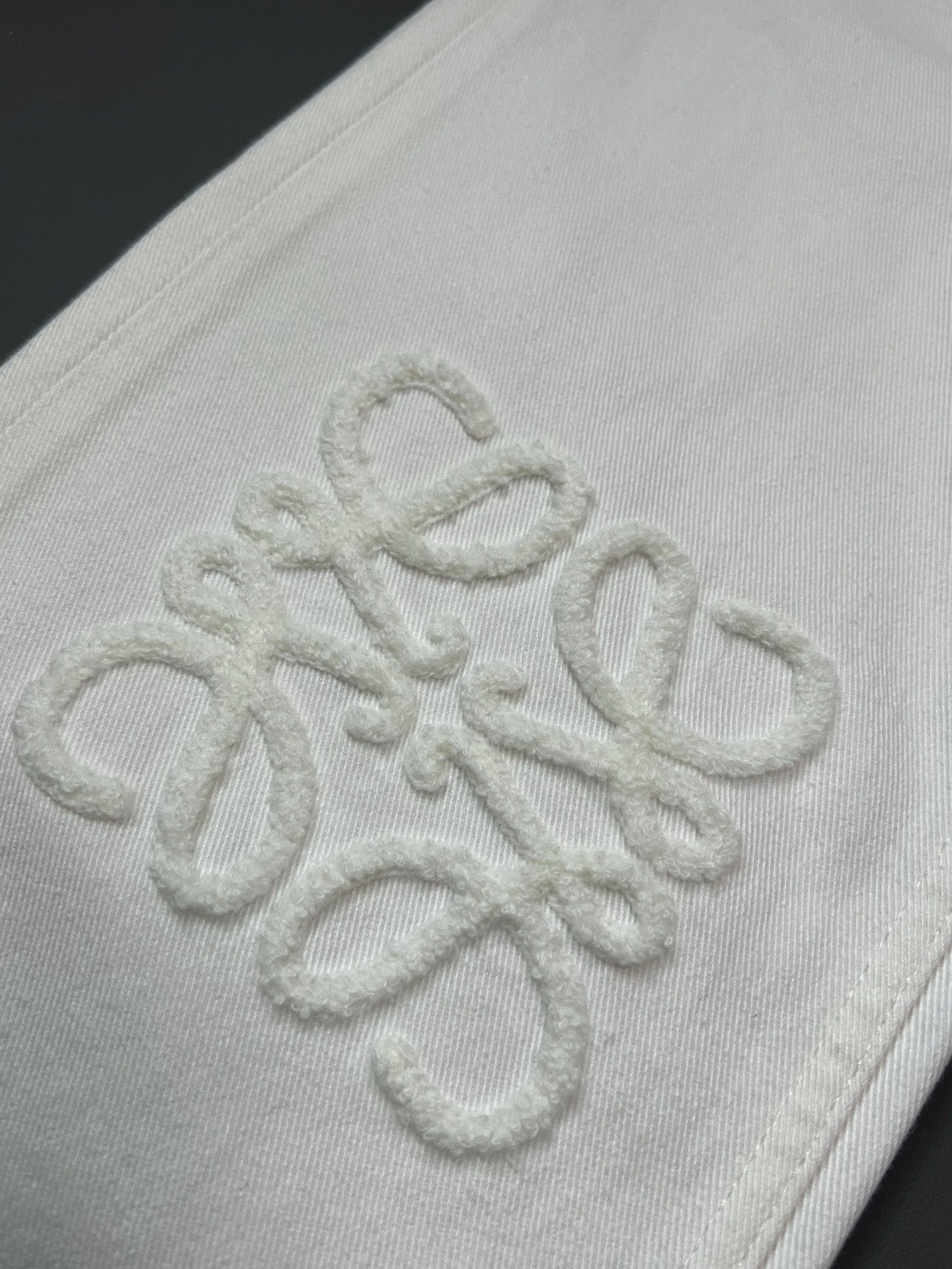 Loew White Anagram White Jean