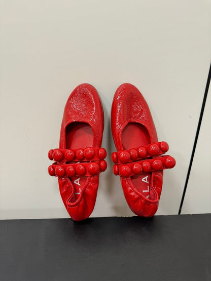 ALAIA SPHERE BALLET FLATS IN CHERRY RED LAMBSKIN