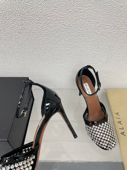 ALAIA HIGH FISHNET PUMPS IN BLACK MESH WITH WHITE RHINSTONES
