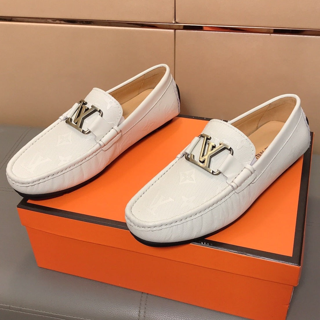 LV LOAFERS IN WHITE CALFSKIN WITH BRANDED EMBOSSING