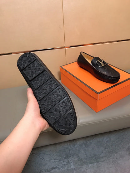 LV LOAFERS IN BLACK CALFSKIN WITH BRANDED EMBOSSING