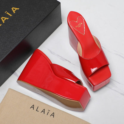 ALAIA PLATFORM WEDGE IN CHERRY RED LAMBSKIN WITH HEART EMBROIDERED