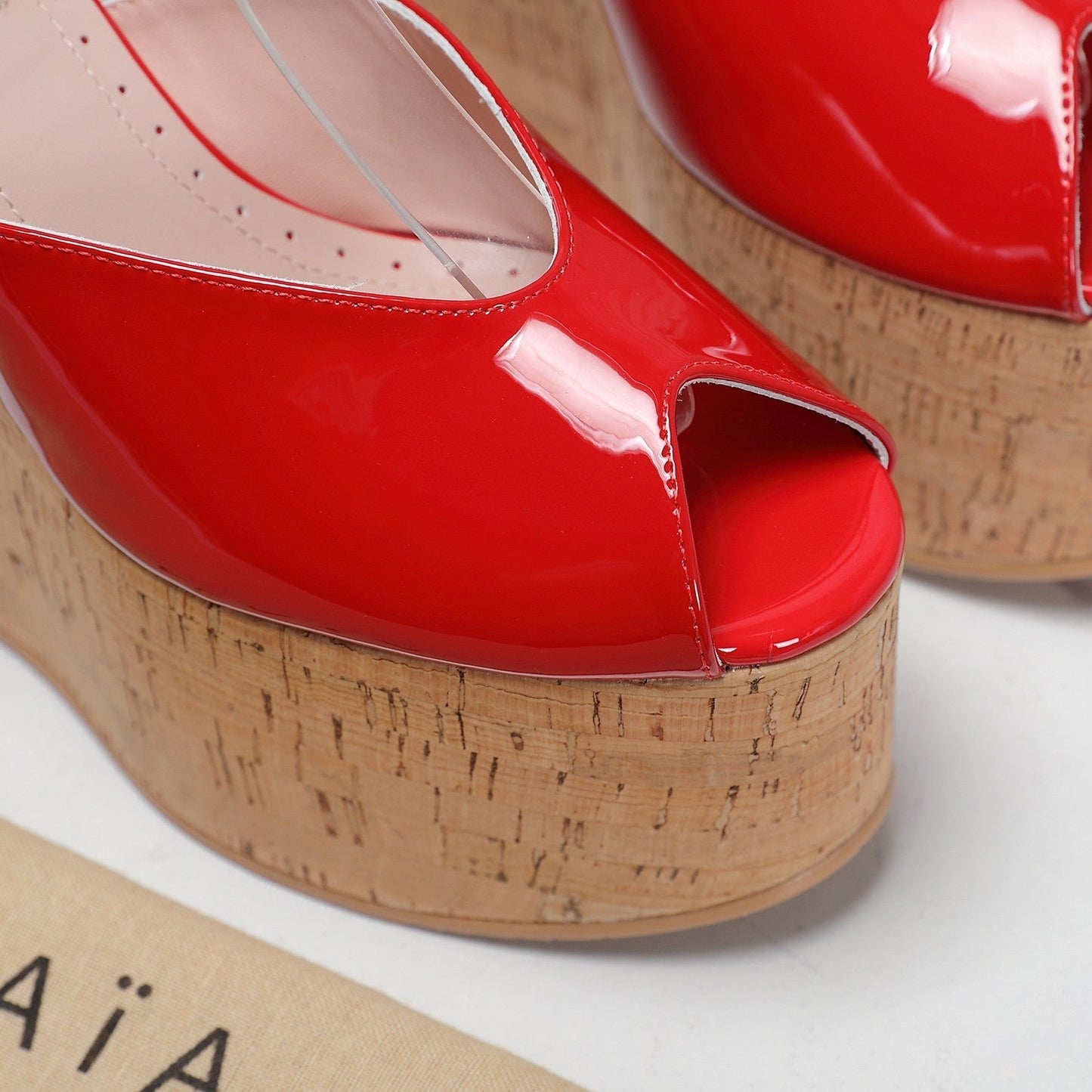 ALAIA WEDGE SANDAL IN CRIMSON RED GLOSSY CALFSKIN AND BEIGE RUBBER