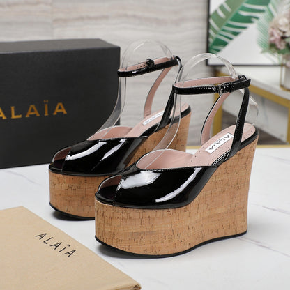 ALAIA WEDGE SANDAL IN BLACK GLOSSY CALFSKIN AND BEIGE RUBBER