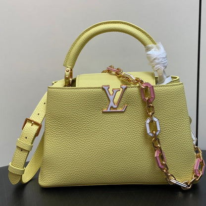 capucines mm 31.5 yellow taurillon leather gold hardware