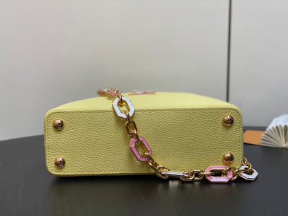 CAPUCINES BB 27 YELLOW TAURILLON GOLD HARDWARE