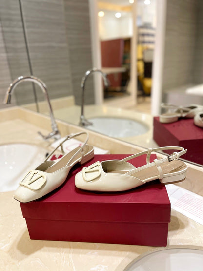 VLOGO WHITE PATENT LEATHER SLINGBACK FLATS