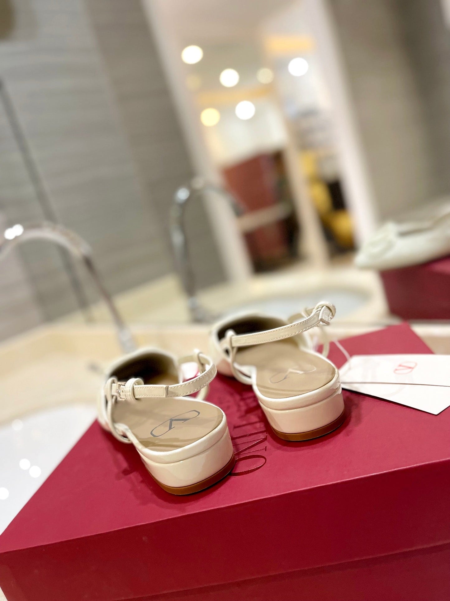 VLOGO WHITE PATENT LEATHER SLINGBACK FLATS