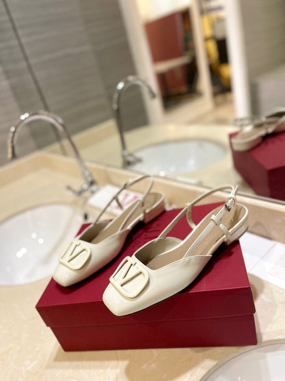 VLOGO WHITE PATENT LEATHER SLINGBACK FLATS