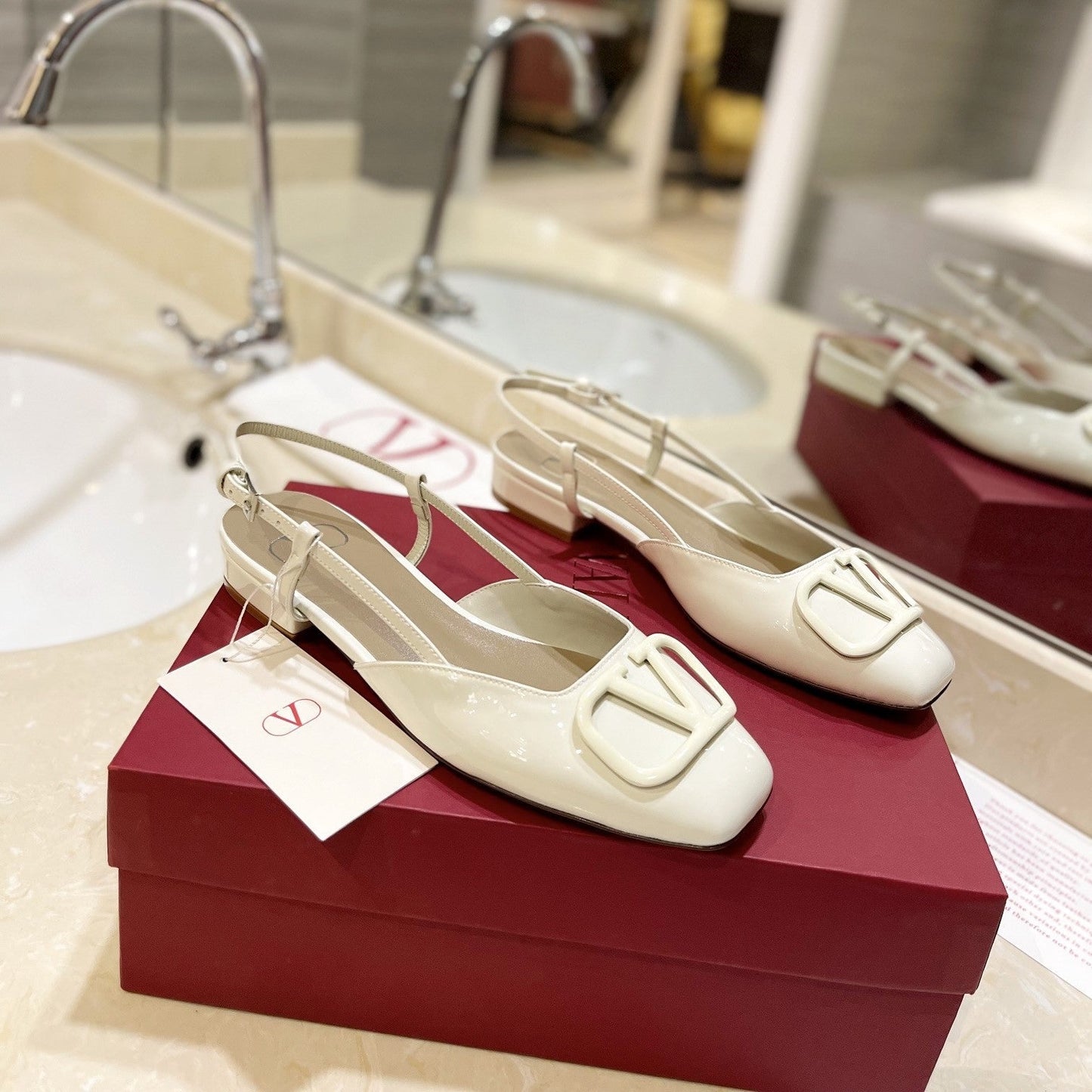 VLOGO WHITE PATENT LEATHER SLINGBACK FLATS