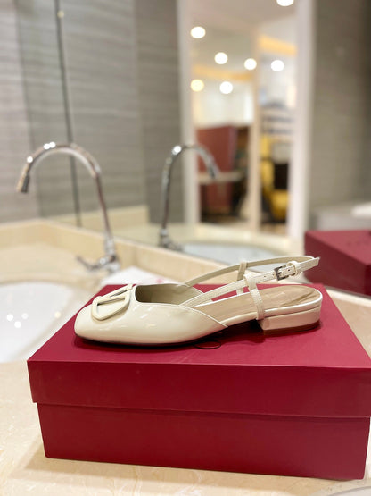 VLOGO WHITE PATENT LEATHER SLINGBACK FLATS